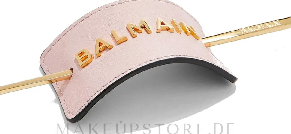 Haarspange mit goldenem Logo